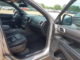 2014 Jeep Grand Cherokee Limited with VIN 1C4RJFBG9EC210507, listed as a IAAI auction lot 42428788 with 141,147 mi miles and . Bid and sale history available at DreamBid. Image 5.