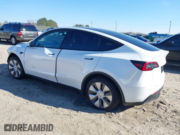 2023 Tesla Model Y Long Range with VIN 7SAYGAEE1PF828338, listed as a IAAI auction lot 40978725 with Not Provided miles and . Bid and sale history available at DreamBid. Image 3.