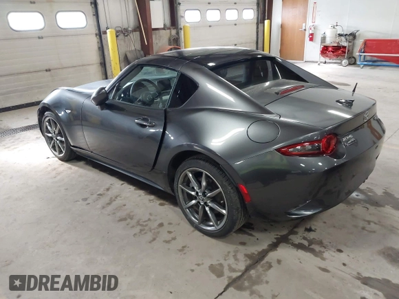 2021 Mazda MX-5 Miata Grand Touring with VIN JM1NDAM73M0451484, listed as a IAAI auction lot 41485044 with 11,328 mi miles and . Bid and sale history available at DreamBid. Image 3.