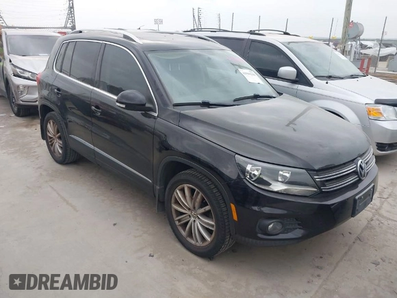 2012 Volkswagen Tiguan SE with VIN WVGAV7AX9CW611202, listed as a IAAI auction lot 41944210 with 118,002 mi miles and . Bid and sale history available at DreamBid. Image 1.