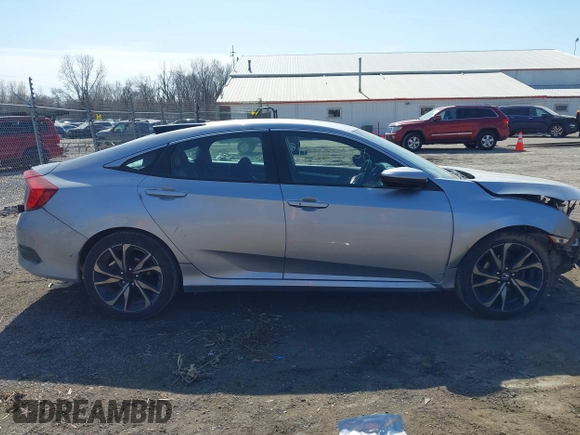 2021 Honda Civic Sport with VIN 2HGFC2F83MH540939, listed as a IAAI auction lot 41789508 with 100,274 mi miles and . Bid and sale history available at DreamBid. Image 14.