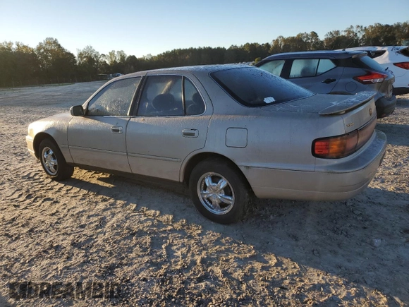 1992 Toyota Camry LE with VIN 4T1SK12E1NU127255, listed as a Copart auction lot 75554584 with 385,507 mi miles and Salvage Title. Bid and sale history available at carsss.com. Image 2.