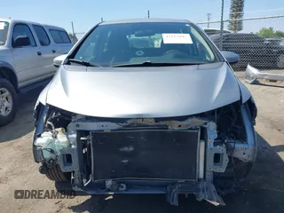 2017 Honda Fit LX with VIN JHMGK5H51HS023212, listed as a IAAI auction lot 42153107 with 106,778 mi miles. Bid and sale history available at carsss.com. Image 13.