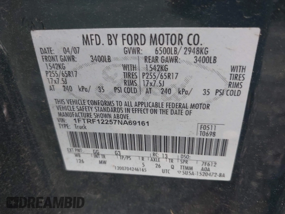 2007 Ford F-150 XL with VIN 1FTRF12257NA69161, listed as a IAAI auction lot 42195807 with 122,875 mi miles. Bid and sale history available at carsss.com. Image 9.