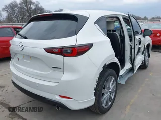 2025 Mazda CX-5 2.5 S Premium Plus Package with VIN JM3KFBEM9S0549107, listed as a IAAI auction lot 41695549 with 3,544 mi miles. Bid and sale history available at carsss.com. Image 4.