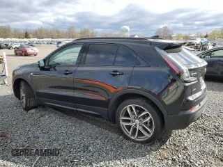 2023 Cadillac XT4 AWD Sport z VIN 1GYFZFR45PF128521, wystawiony jako Copart lot #53185325 z przebiegiem 17 657 mil mil oraz Szkoda całkowita • Salvage title. Historia ofert i sprzedaży dostępna na DreamBid. Obrazek 2.