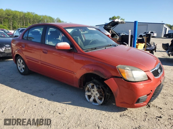2010 Kia Rio LX with VIN KNADH4A32A6678111, listed as a Copart auction lot 52632895 with 98,392 mi miles and Salvage Title. Bid and sale history available at carsss.com. Image 4.