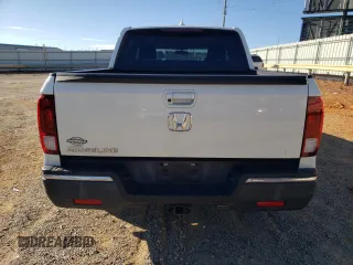 2019 Honda Ridgeline Sport with VIN 5FPYK2F14KB004329, listed as a Copart auction lot 76247454 with 132,291 mi miles and Salvage title. Bid and sale history available at DreamBid. Image 6.