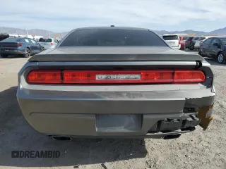 2012 Dodge Challenger R/T z VIN 2C3CDYBT2CH268592, wystawiony jako Copart lot #53143395 z przebiegiem 101 390 mil mil oraz Szkoda całkowita • Salvage title. Historia ofert i sprzedaży dostępna na DreamBid. Obrazek 6.