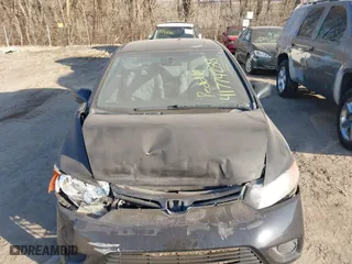 2007 Honda Civic Cpe LX with VIN 2HGFG12657H536575, listed as a IAAI auction lot 41774288 with 221,792 mi miles. Bid and sale history available at carsss.com. Image 6.