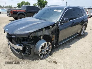 2023 BMW X5 xDrive45e with VIN 5UXTA6C00P9N55656, listed as a Copart auction lot 61500355 with 74,792 mi miles and Salvage title. Bid and sale history available at DreamBid. Image 1.