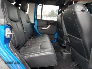 2016 Jeep Wrangler Unlimited Rubicon z VIN 1C4HJWFG2GL253918, wystawiony jako Copart lot #52332475 z przebiegiem 153 813 mil mil oraz Szkoda całkowita • Salvage title. Historia ofert i sprzedaży dostępna na DreamBid. Obrazek 10.