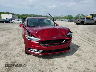 2017 Ford Fusion Hybrid Titanium with VIN 3FA6P0RU2HR394713, listed as a Copart auction lot 56070815 with 95,098 mi miles and Salvage title. Bid and sale history available at DreamBid. Image 13.