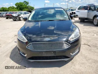2018 Ford Focus Titanium with VIN 1FADP3J25JL233117, listed as a Copart auction lot 60458145 with 131,877 mi miles and Clean title. Bid and sale history available at DreamBid. Image 7.