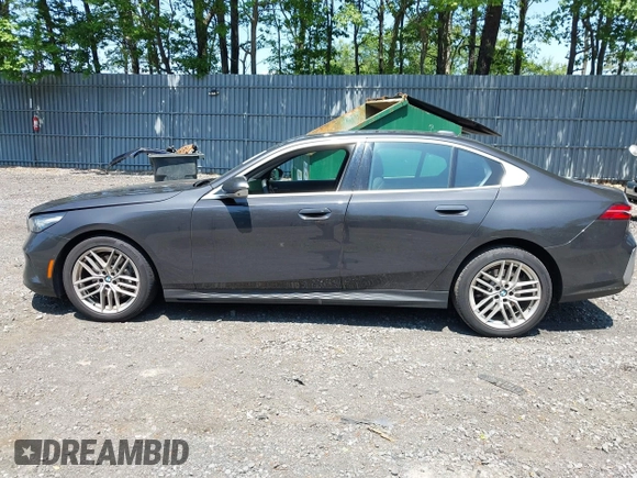 2024 BMW 5 Series 530i xDrive with VIN WBA53FJ00RCS54220, listed as a IAAI auction lot 42403628 with 19,047 mi miles and . Bid and sale history available at DreamBid. Image 14.