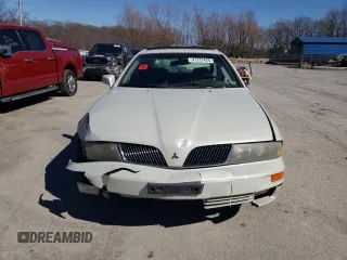 2003 Mitsubishi Diamante LS z VIN 6MMAP67P23T003075, wystawiony jako Copart lot #47373425 z przebiegiem 216 694 mil mil oraz Szkoda całkowita • Salvage title. Historia ofert i sprzedaży dostępna na DreamBid. Obrazek 5.