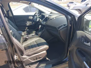 2016 Ford Escape Titanium with VIN 1FMCU0JX8GUC06601, listed as a IAAI auction lot 41785774 with 121,427 mi miles. Bid and sale history available at carsss.com. Image 5.