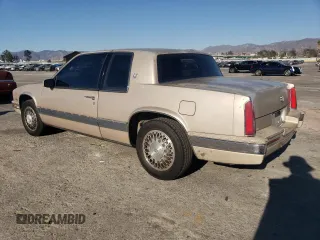 1988 Cadillac Eldorado with VIN 1G6EL1153JU612185, listed as a Copart auction lot 83786144 with 133,882 mi miles and Salvage Title. Bid and sale history available at DreamBid. Image 2.