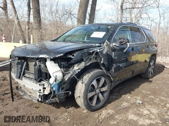 2018 Chevrolet Traverse LT z VIN 1GNEVHKWXJJ199472, wystawiony jako IAAI lot #41499911 z przebiegiem 129 127 mil mil oraz . Historia ofert i sprzedaży dostępna na DreamBid. Obrazek 17.
