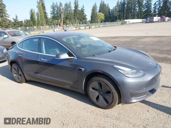2018 Tesla Model 3 Long Range Battery with VIN 5YJ3E1EA1JF021139, listed as a IAAI auction lot 42116626 with 83,003 mi miles and . Bid and sale history available at DreamBid. Image 13.