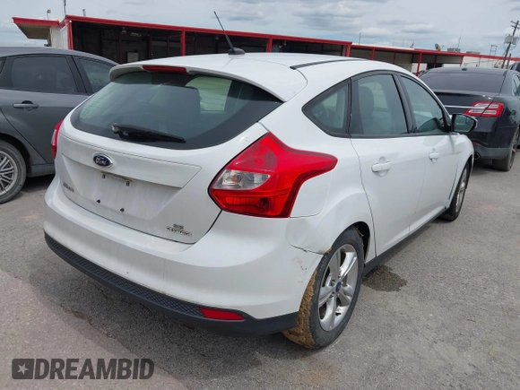 2014 Ford Focus SE with VIN 1FADP3K24EL209329, listed as a IAAI auction lot 42223749 with 141,196 mi miles and . Bid and sale history available at carsss.com. Image 4.