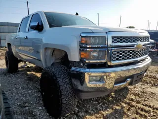 2015 Chevrolet Silverado 1500 LTZ with VIN 3GCPCSEC8FG119813, listed as a Copart auction lot 50188715 with 128,464 mi miles and Salvage Title. Bid and sale history available at carsss.com. Image 4.