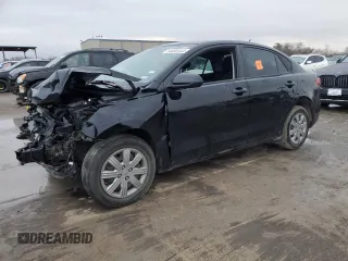 2023 Kia Rio LX with VIN 3KPA24AD7PE616450, listed as a Copart auction lot 84690444 with 28,908 mi miles and Salvage Title. Bid and sale history available at DreamBid. Image 1.