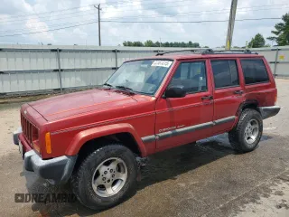 1999 Jeep Cherokee Sport with VIN 1J4FT68SXXL669549, listed as a Copart auction lot 62367015 with 194,446 mi miles and Salvage title. Bid and sale history available at DreamBid. Image 1.