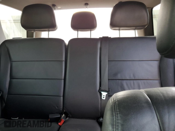 2010 Ford Escape Limited с VIN 1FMCU9EG4AKC56901, выставлен на аукционе Copart как лот 57163525 с пробегом 165 993 миль миль и Списание • Salvage title. История ставок и продаж доступна на DreamBid. Изображение 10.