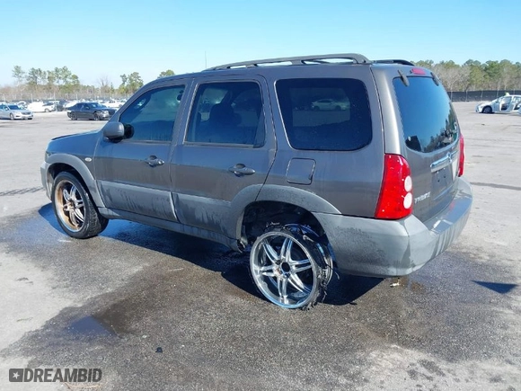 2006 Mazda Tribute i with VIN 4F2YZ02Z66KM05605, listed as a IAAI auction lot 41508057 with 266,708 mi miles. Bid and sale history available at carsss.com. Image 3.