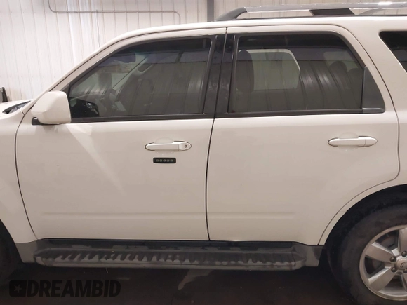 2011 Mercury Mariner Premier with VIN 4M2CN9HG3BKJ02026, listed as a IAAI auction lot 40254703 with 99,000 mi miles and . Bid and sale history available at DreamBid. Image 14.