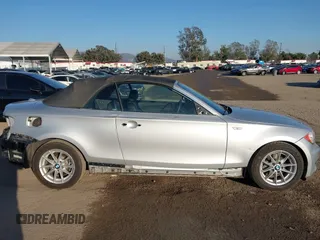 2011 BMW 1 Series 128i with VIN WBAUN1C59BVH83776, listed as a IAAI auction lot 41616463 with 55,865 mi miles and . Bid and sale history available at DreamBid. Image 14.