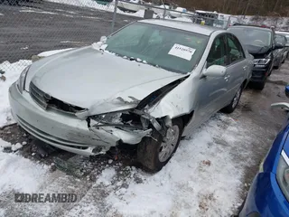 2004 Toyota Camry LE with VIN 4T1BF32K64U588682, listed as a IAAI auction lot 41520570 with 112,646 mi miles. Bid and sale history available at carsss.com. Image 2.