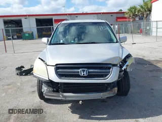 2003 Honda Pilot EX with VIN 2HKYF18603H504829, listed as a IAAI auction lot 42083247 with 247,429 mi miles and . Bid and sale history available at carsss.com. Image 12.