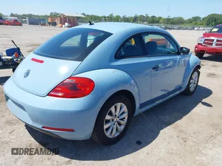 2015 Volkswagen Beetle Fleet Edition with VIN 3VWF17AT8FM644065, listed as a IAAI auction lot 42021412 with 135,525 mi miles and . Bid and sale history available at DreamBid. Image 4.