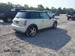 2006 MINI Hardtop with VIN WMWRC33506TK18077, listed as a IAAI auction lot 42583190 with 170,819 mi miles and . Bid and sale history available at DreamBid. Image 4.