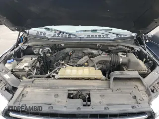 2019 Ford F-150 XL with VIN 1FTEW1E55KFC10642, listed as a Copart auction lot 62811755 with 128,286 mi miles and Salvage title. Bid and sale history available at DreamBid. Image 11.
