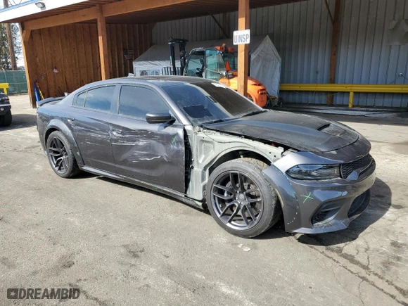 2021 Dodge Charger Scat Pack with VIN 2C3CDXGJ5MH602049, listed as a Copart auction lot 46069295 with 21,462 mi miles and Salvage Title. Bid and sale history available at carsss.com. Image 4.