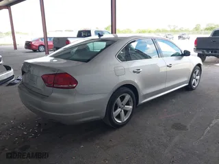 2014 Volkswagen Passat Wolfsburg Ed with VIN 1VWAS7A32EC036193, listed as a IAAI auction lot 41606595 with 77,536 mi miles. Bid and sale history available at carsss.com. Image 4.