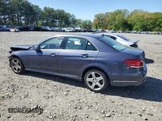 2014 Mercedes-Benz E 350 Luxury with VIN WDDHF8JB0EA922470, listed as a Copart auction lot 54734155 with 137,999 mi miles and Salvage Title. Bid and sale history available at DreamBid. Image 2.