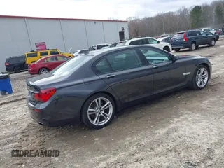 2014 BMW 7 Series 740Li with VIN WBAYE4C56ED138397, listed as a IAAI auction lot 41726117 with 116,291 mi miles. Bid and sale history available at carsss.com. Image 4.