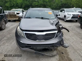 2012 Kia Sportage LX z VIN KNDPB3A20C7217165, wystawiony jako Copart lot #60999525 z przebiegiem 128 231 mil mil oraz Szkoda całkowita • Salvage title. Historia ofert i sprzedaży dostępna na DreamBid. Obrazek 5.
