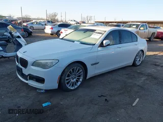 2013 BMW 7 Series 740i with VIN WBAYA6C54DD143796, listed as a IAAI auction lot 41433835 with 1 mi miles. Bid and sale history available at carsss.com. Image 2.