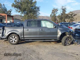2019 Ford F-150 XL with VIN 1FTEW1CP0KKC77628, listed as a IAAI auction lot 41603947 with 164,062 mi miles and . Bid and sale history available at carsss.com. Image 13.