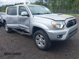 2013 Toyota Tacoma PreRunner z VIN 3TMJU4GN7DM140356, wystawiony jako IAAI lot #42021090 z przebiegiem 96 473 mil mil oraz . Historia ofert i sprzedaży dostępna na DreamBid. Obrazek 1.