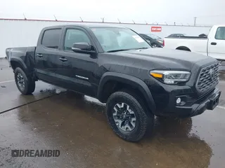 2023 Toyota Tacoma SR5 z VIN 3TMDZ5BN0PM160657, wystawiony jako IAAI lot #41981452 z przebiegiem 34 444 mil mil oraz . Historia ofert i sprzedaży dostępna na DreamBid. Obrazek 1.