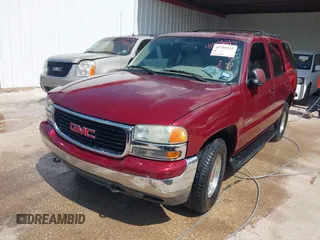 2002 GMC Yukon SLE with VIN 1GKEC13V12R116854, listed as a IAAI auction lot 41799335 with 270,063 mi miles. Bid and sale history available at carsss.com. Image 2.