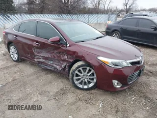 2015 Toyota Avalon Limited with VIN 4T1BK1EB7FU167777, listed as a IAAI auction lot 41457339 with 98,239 mi miles and . Bid and sale history available at DreamBid. Image 1.