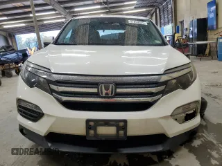 2018 Honda Pilot EX-L with VIN 5FNYF6H62JB043318, listed as a Copart auction lot 57853335 with 57,354 mi miles and Salvage title. Bid and sale history available at DreamBid. Image 5.