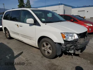 2011 Dodge Grand Caravan Crew with VIN 2D4RN5DG6BR680446, listed as a Copart auction lot 51855585 with 136,789 mi miles and Salvage Title. Bid and sale history available at DreamBid. Image 4.